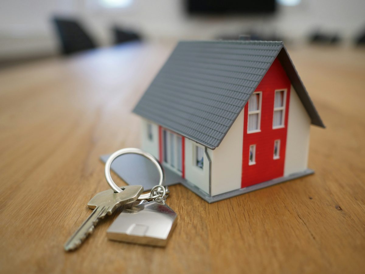 house keys refinance documents cash out refinance to pay off debt